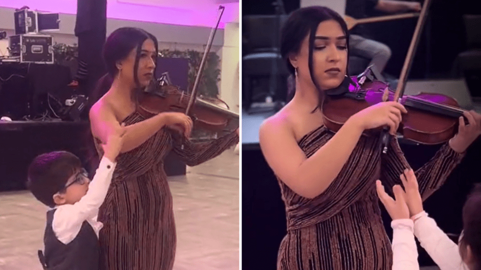 Un espectáculo de violín es interrumpido por niños durante una boda